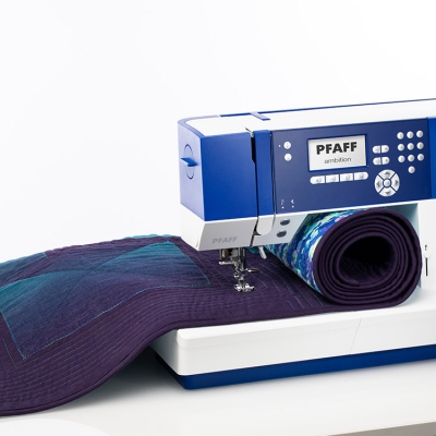 PFAFF AMBITION 610 Maszyna do szycia wieloczynnościowa sterowana komputerowo, 110 ściegów, 7x auto. obszywanie dziurki, system ITD, 8 stopek